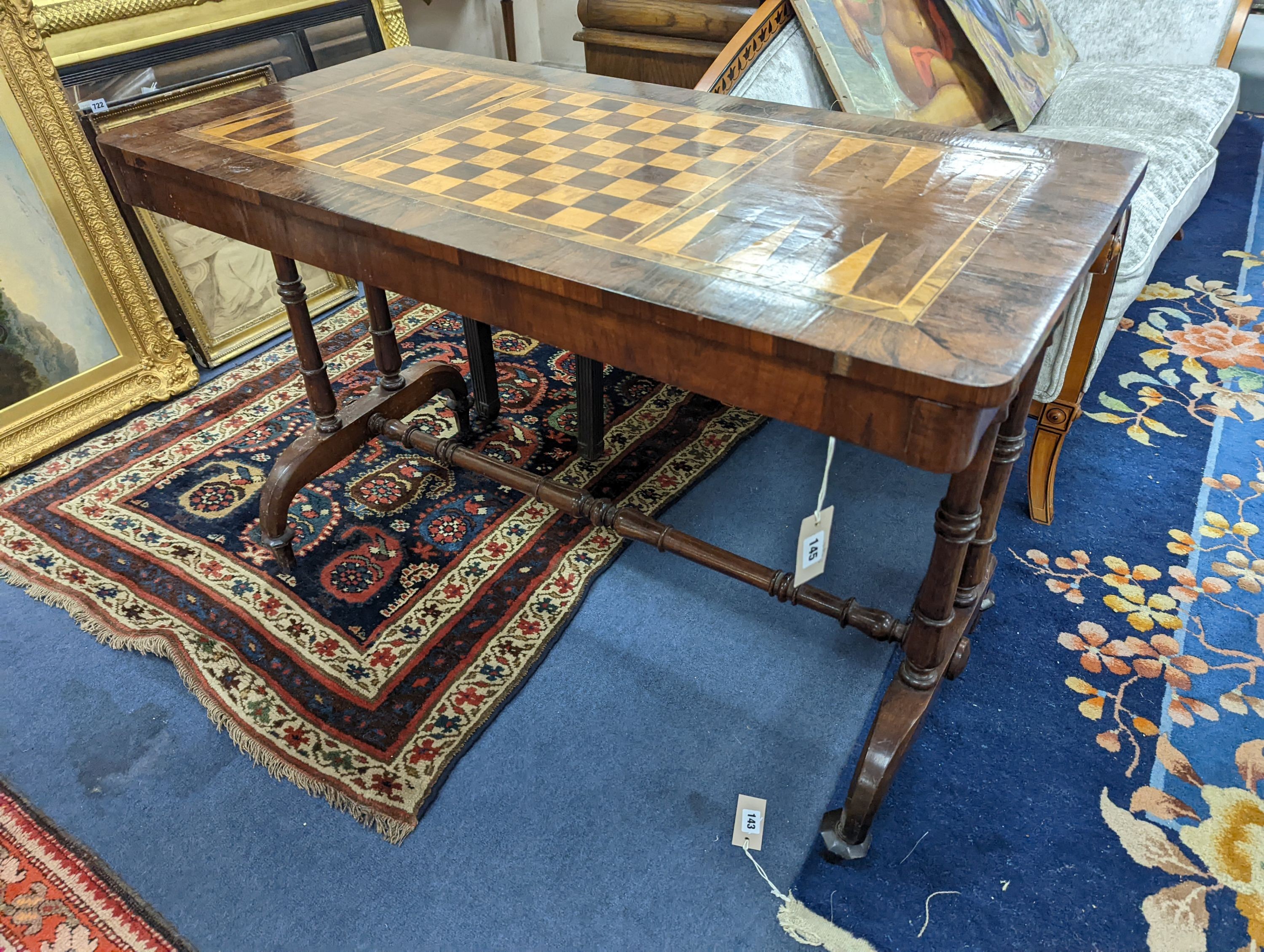 A Victorian rectangular parquetry inlaid rosewood and mahogany games table, width 106cm, depth 53cm, height 71cm